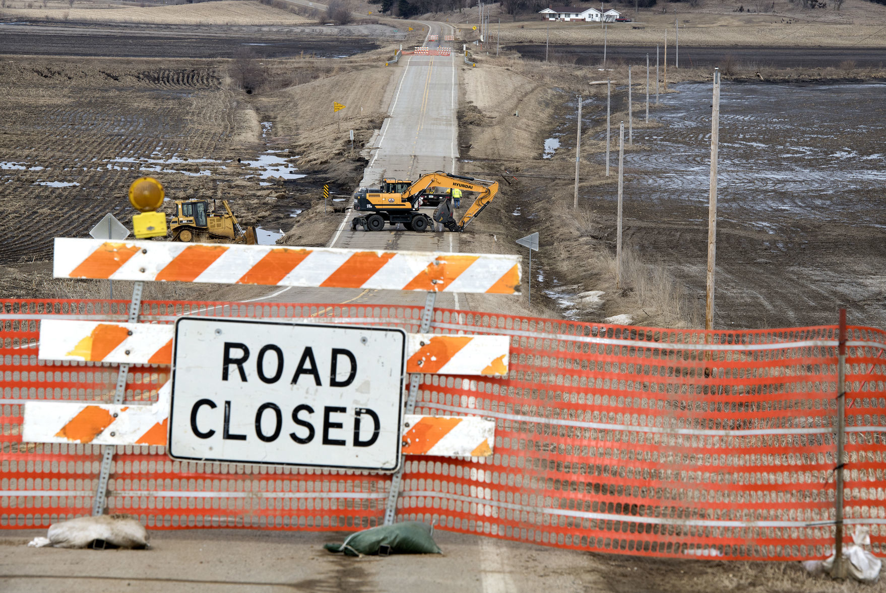 Flooding road damage